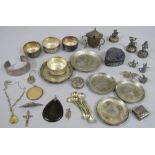 A collection of mainly eastern white metal items to include trinket dishes, salts, menu holders