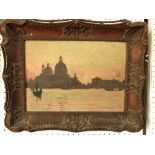 A late 19th century study of a Venetian lagoon scene with gondolas, St Marks Cathedral at sunset,
