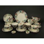 A collection of Royal Cauldon Victoria pattern wares including teapot, three jugs, two sugar
