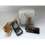 World War II compass and mess tin, with a leather cased theodolite scope (3)