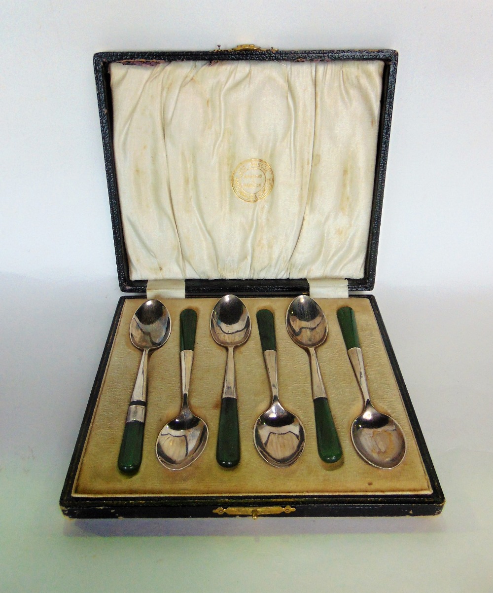 A cased set of 6 art deco silver teaspoons, with green stone handles, marked Birmingham 1923