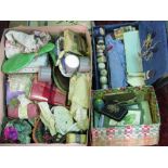 Two boxes containing a vast collection of sewing related items to include haberdashery wares and