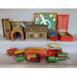A collection of Hornby tin plate Railwayana to include locomotives, carriages, tracks, building