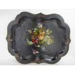 A Victorian ebonised papier mache serpentine tray, with mother of pearl inlay and decorated with