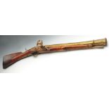 A late 18th century flintlock coaching blunderbuss by Meis & Co, with brass barrel and mahogany