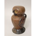 A studio pottery jug and cover in the form of a two-sectional owl with slip decoration and with