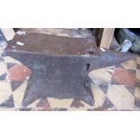 An old cast iron anvil, 52 cm long x 30 cm height approx