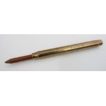 A 9ct ejector pencil, 7.2cm approx, 12.4g