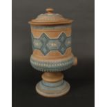 A Doulton Lambeth Silicon urn and cover with pouring spout to base, moulded and incised blue