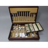 Teak cased canteen of various silver plated beaded flatware together with a further part fitted