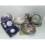 A collection of communion white metal to include a leather cased travelling communion set, three