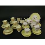 A collection of Paragon china tea wares in the Art Deco manner with yellow floral decoration