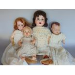 Three antique wooden dolls to include Simon and Hallig doll, further Heubach and Koppelsdorf and two