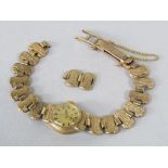 Attractive vintage ladies Rotary 21 jewel 9ct gold cocktail watch upon a stylised textured link