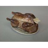 A 19th century continental mustard pot, cover and spoon in the form of a goose, the spoon in the