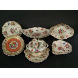 A collection of 19th century dessert wares with painted floral sprigs and sprays comprising an