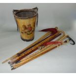 A 19th century leather fire bucket of cylindrical tapered form, with overlaid polychrome royal