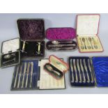 A collection of boxed silver flatware to include boxed set of six silver handled fruit knives, a