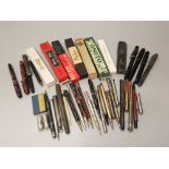 A large quantity of vintage fountain pens, pencils , boxes and leads, etc