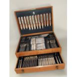 Art deco Mappin & Webb oak canteen of cutlery, the hinged lid enclosing a part fitted interior