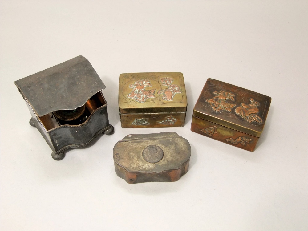 Silver plated inkwell with serpentine outline, two Japanese brass and copper overlaid detail and a