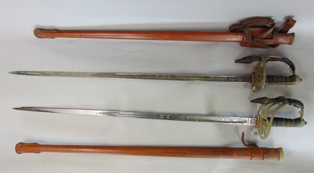 Two George V Army officers swords, Oxford and Bucks regiments, the blades by Wilkinson