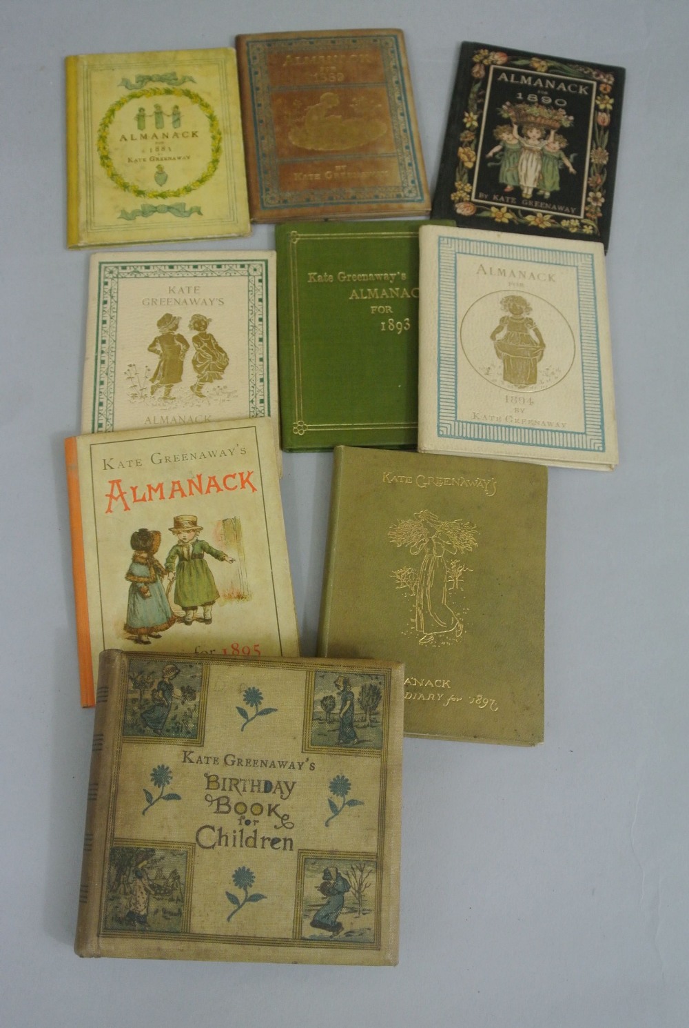 A collection of eight Kate Greenaway Almanacks, 1883, 1889, 1890, 1892-1895 and 1897, together