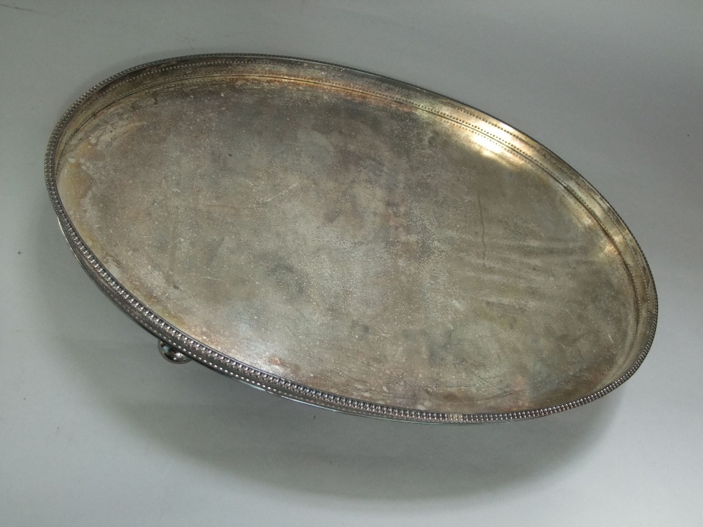 A large oval silver plated gallery tray together with a collection of good quality silver plated