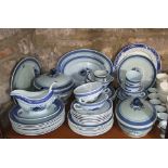 A quantity of Danish dinner wares with blue painted floral detail and basket weave border