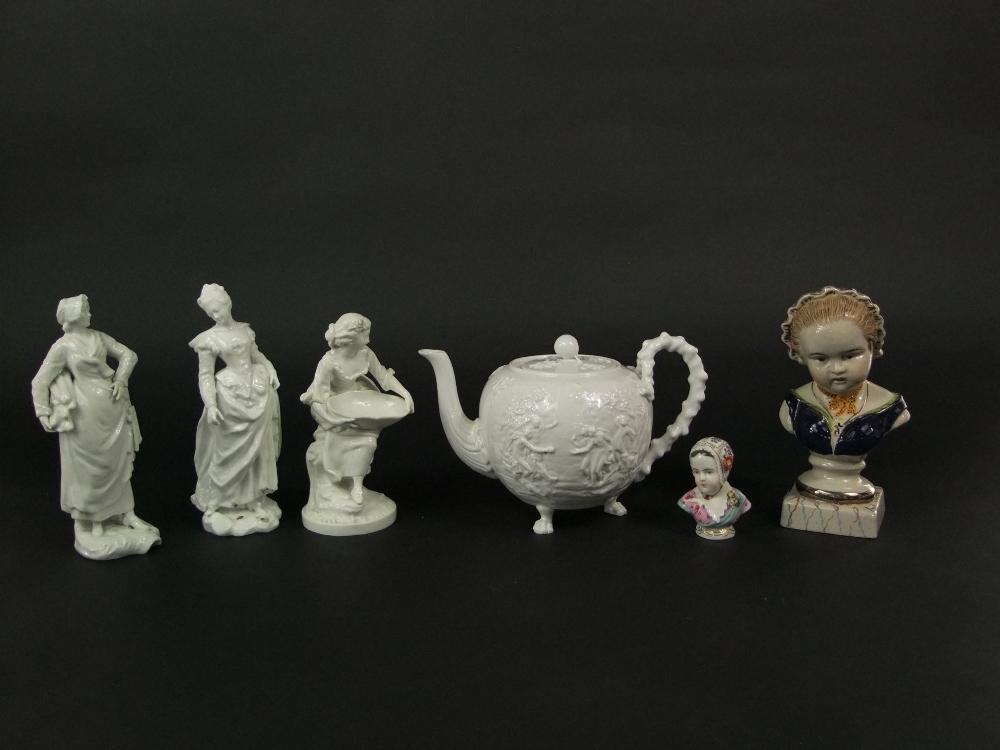 A collection of mainly 19th century continental ceramics including a white glazed Capodimonte teapot