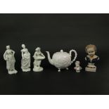 A collection of mainly 19th century continental ceramics including a white glazed Capodimonte teapot