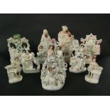 A collection of ten 19th century Staffordshire figure group, including Abraham and Isaac, an