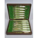 Mahogany canteen of pearl handled Walker & Hall silver cutlery comprising six knives and six
