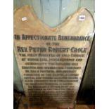 A reclaimed ecclesiastical coloured marble remembrance plaque of arched form with well detailed