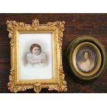 Late 19th century school - Miniature portrait of a young child in lace dress with blue ribbons,