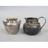 Early 20th century silver ovoid cream jug; together with a further silver sucrier, 9oz approx (2)