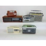 A collection of six radios to include a Roberts RD-27DAB radio and five vintage examples