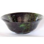 Chinese polished spinach jade pedestal bowl with flared rim, 15cm diameter (af)