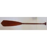Tribal interest - Carved hard wood Indonesian paddle with carved knop finial, 140cm long