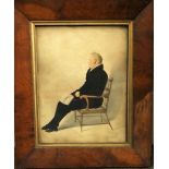 19th century British school - Study of a seated man holding a book, watercolour and body colour,