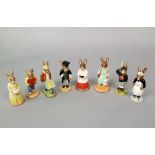 A collection of eight Royal Doulton Bunnykins figures to include Schoolmaster, Choir singer,