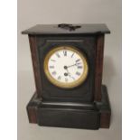 19th century black slate mantle clock fitted with an enamel dial, the single train dial with Roman