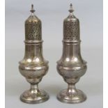 A pair of George III silver baluster castors, maker CF?, London 1801, 16cm high, 6.5oz approx (2)