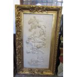 A large deep gilt stepped frame of rectangular form with tied ribbon, foliate and further detail
