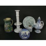 A collection of 19th century continental tin glazed earthen wares including a French blue and