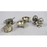 Eastern white metal cruet set comprising two salts, two peppers and two mustards with spoons,