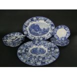 A collection of Woods ware blue and white printed dinner wares comprising four oval graduated meat