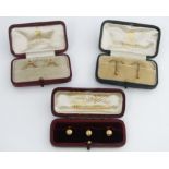 Three 18ct dress buttons together with two pairs of unmarked 9ct collar clips, all cased, 5.9g total