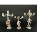 A pair of 19th century four branch candelabra, the columns with applied figures of male and female