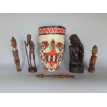 Tribal interest - Carved wooden figure of a seated gentleman, together with four further figures